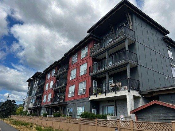 Tristan standing with client